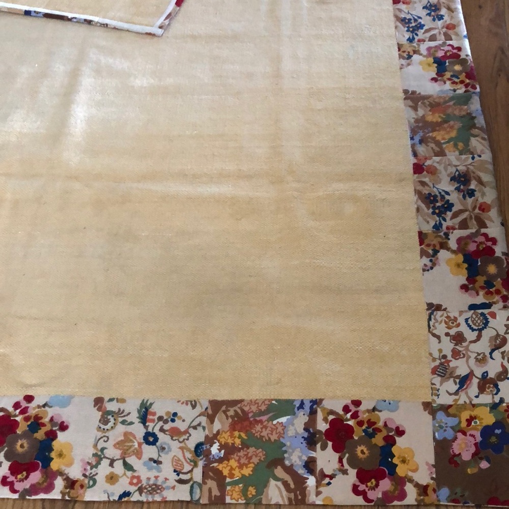Area Rug. Multi color floral border.